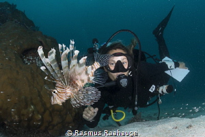 Having fun with lionfish by Rasmus Raahauge 